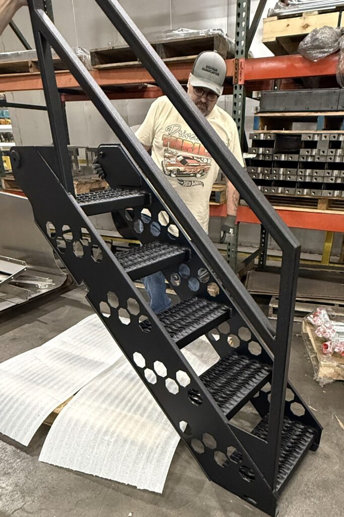 Fabricated outdoor steps with railing