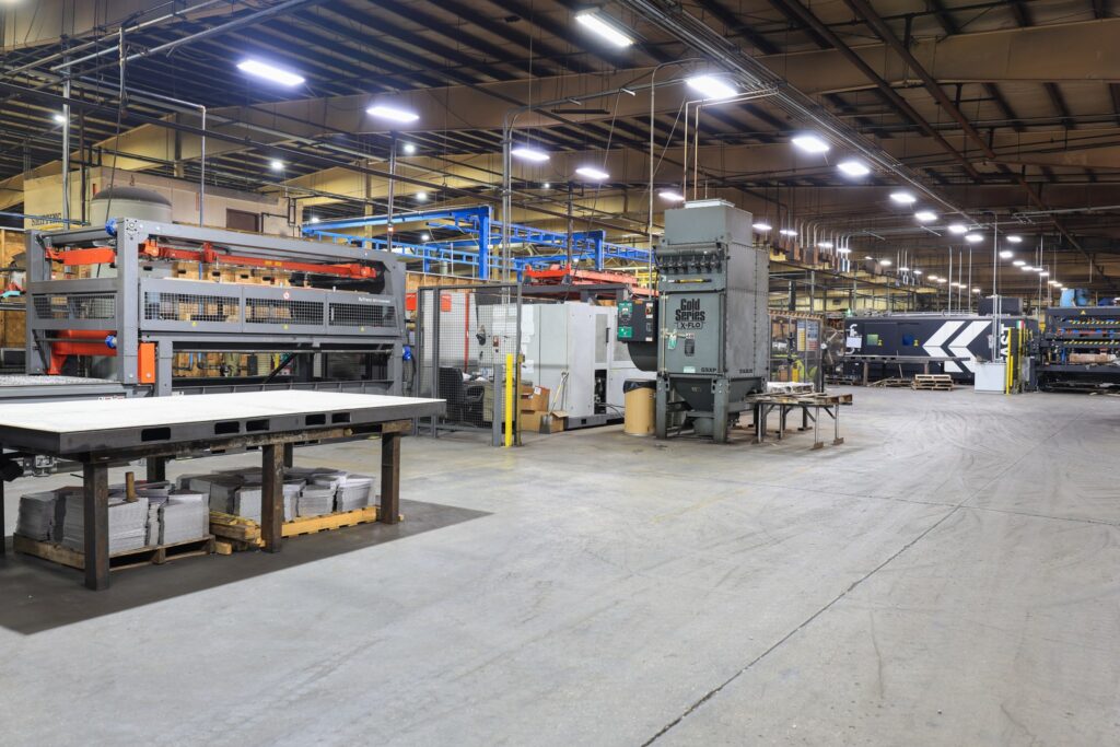 Red Oak Fabrication shop floor with fabrication equipment and work tables